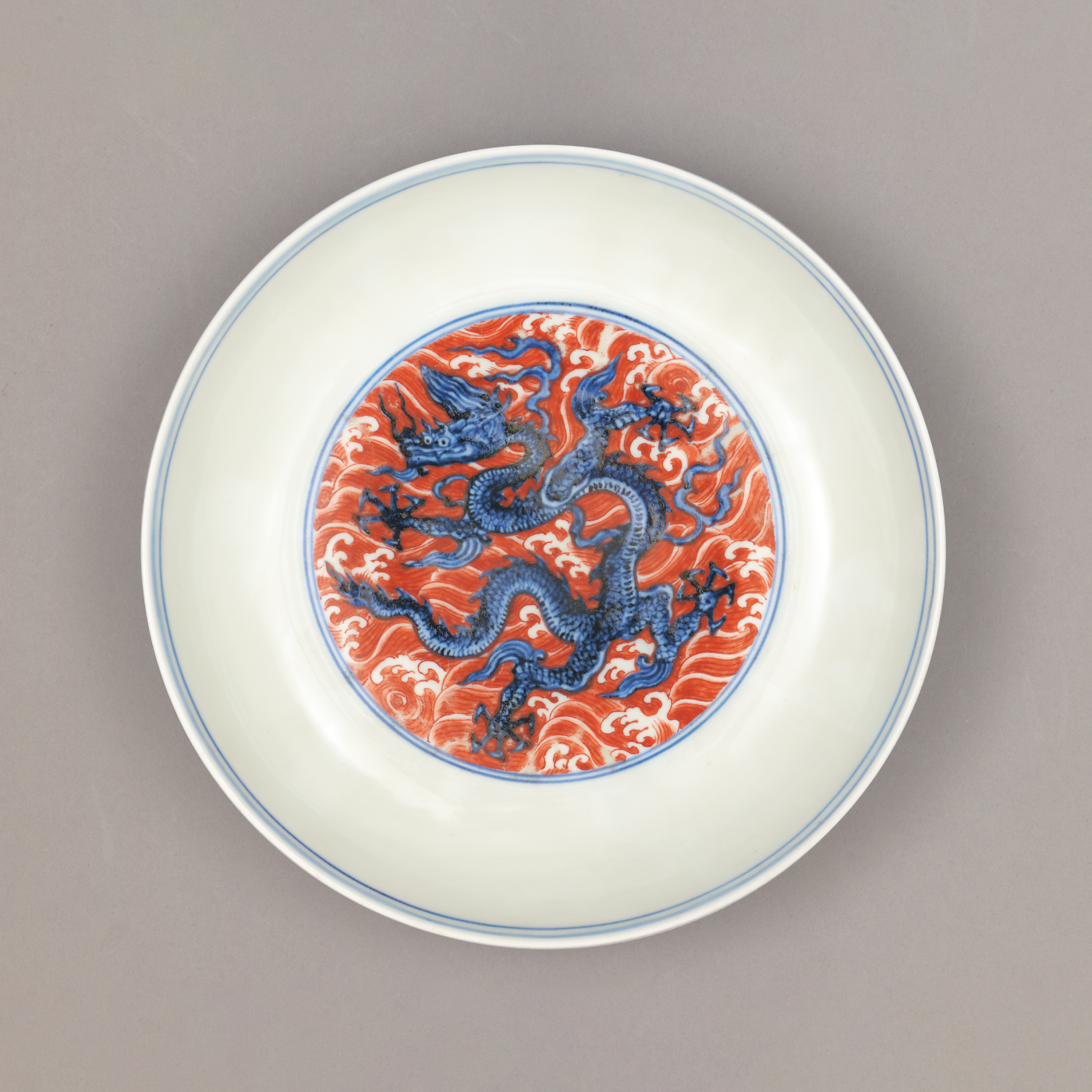 Dish with dragons among waves